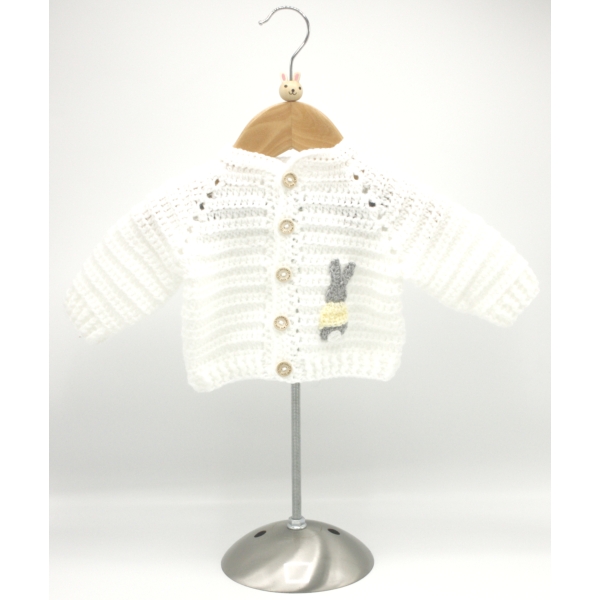 Crochet White Cardigan, Embellished with Grey Rabbit, Wearing a Yellow Jumper, Size 0-3 Months