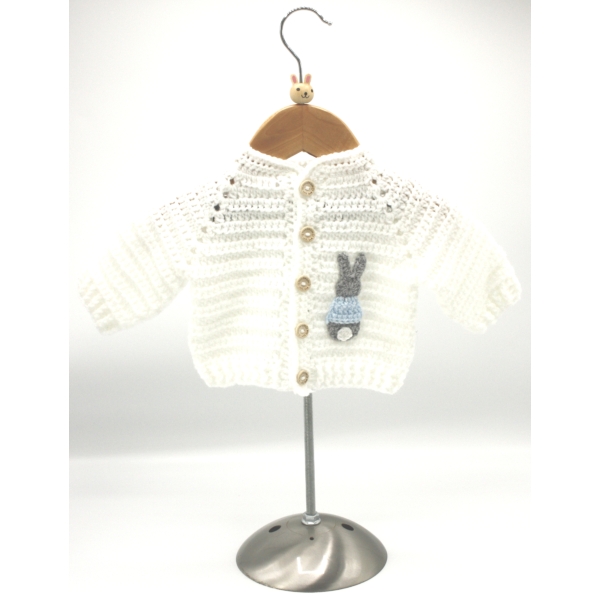 Crochet White Cardigan, Embellished with Grey Rabbit, Wearing a Blue Jumper, Size 0-3 Months