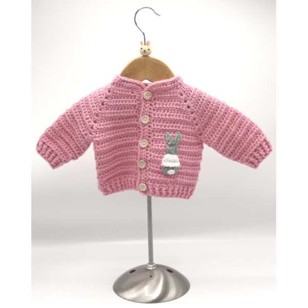 Crochet Light Pink Cardigan, Embellished with Grey Rabbit, Wearing a White Jumper, Size 0-3 Months